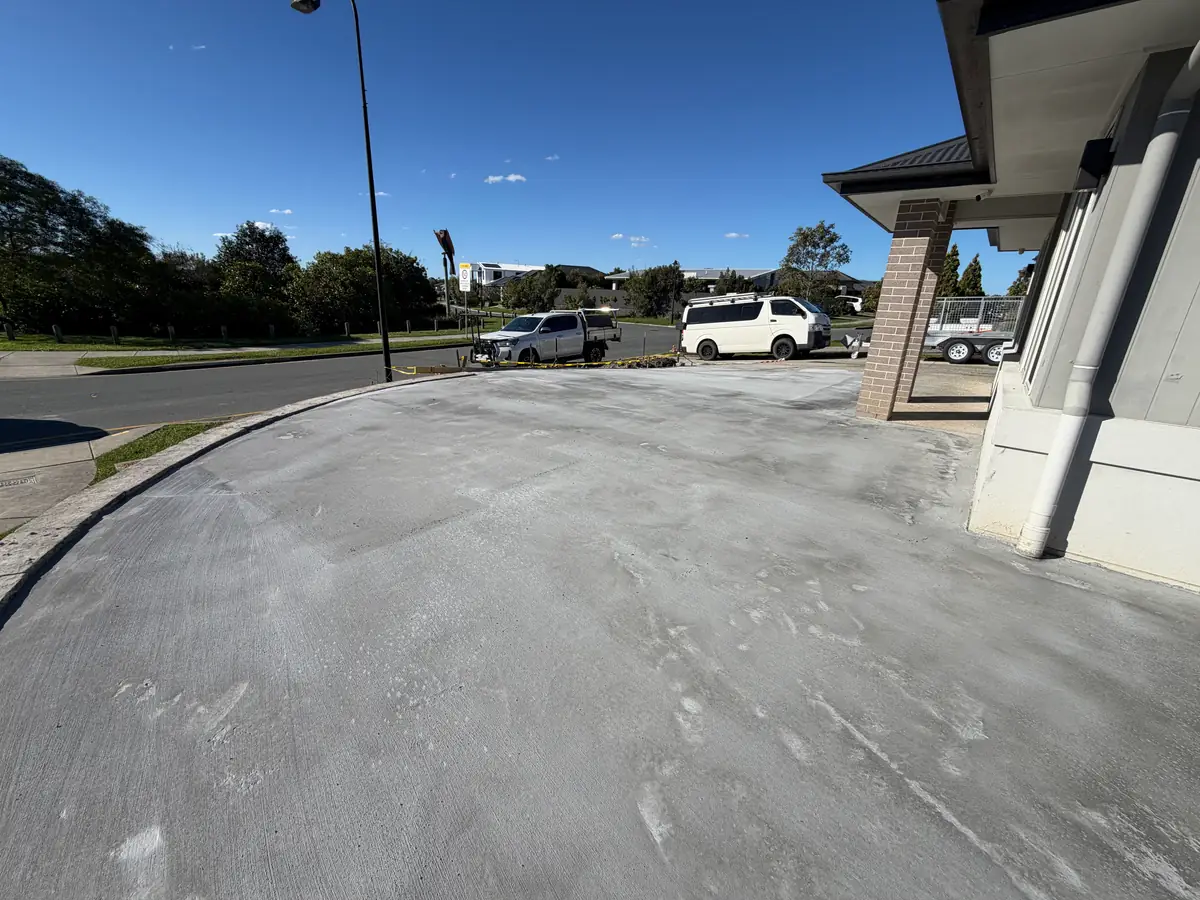 Wide driveway and slab poured on a corner block