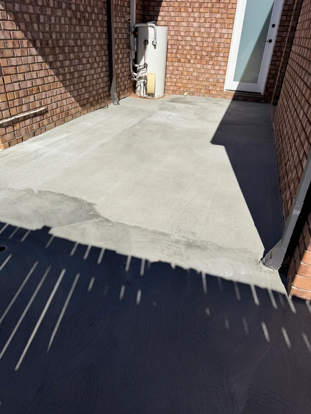 Courtyard slab finished up to the back door