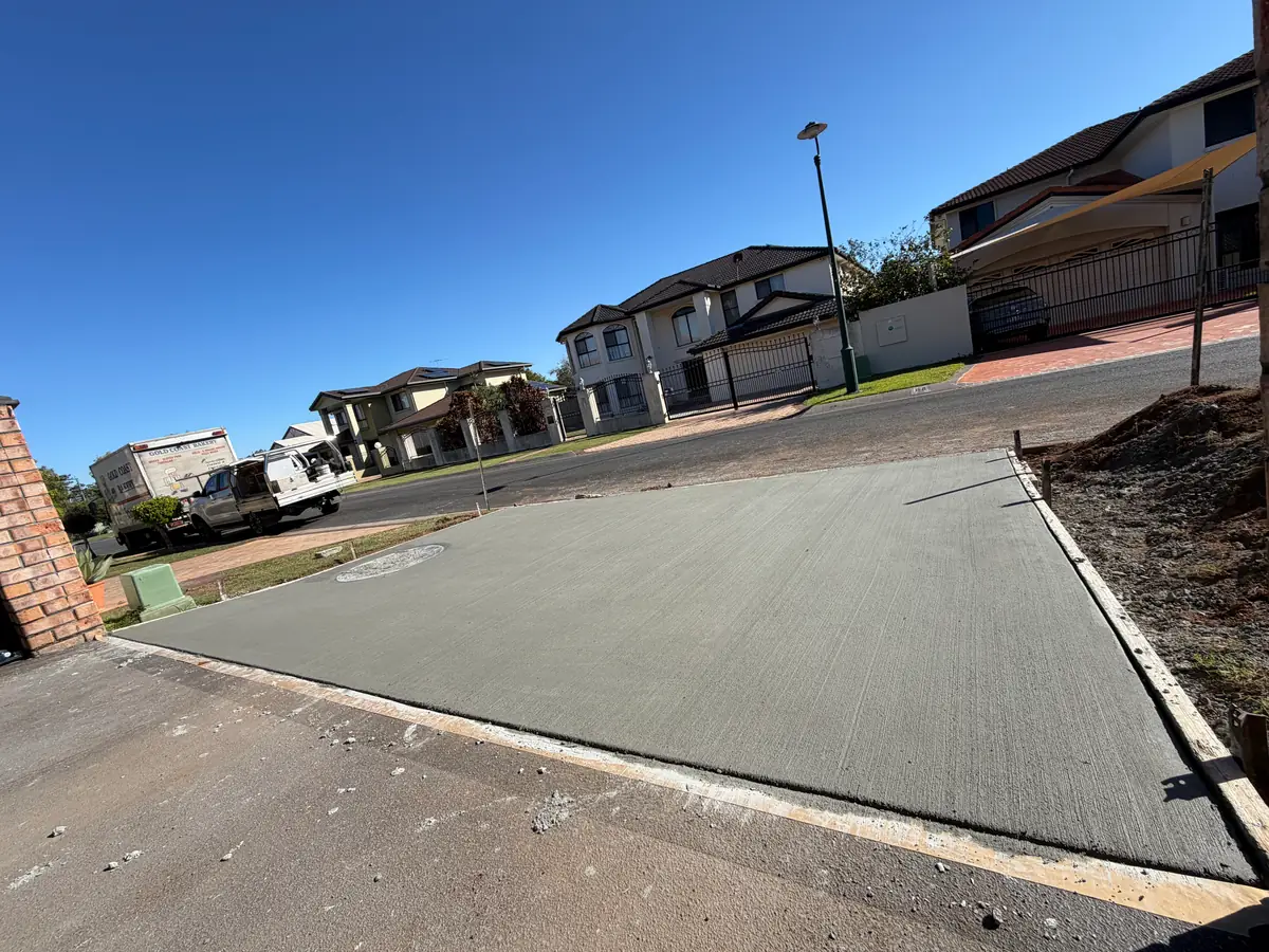 Long driveway poured down to the kerb