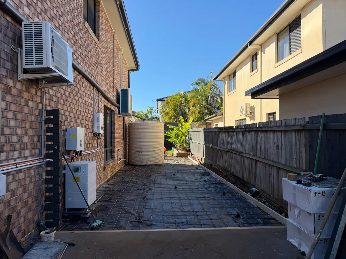 Side of house formed up with membrane and mesh ready for concrete